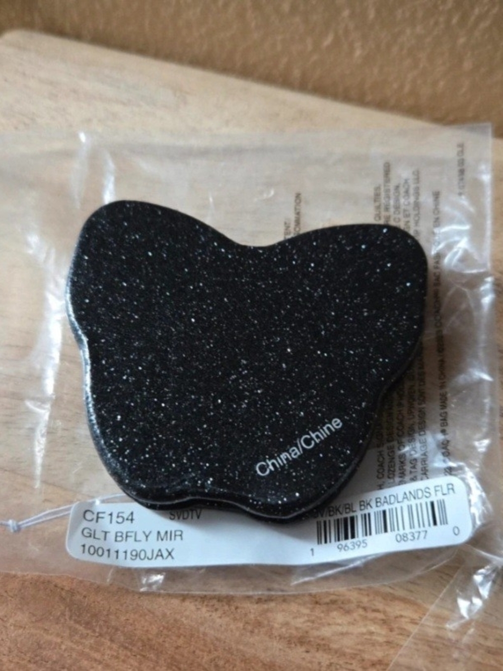 Coach Black Glitter Butterfly Phone Grip